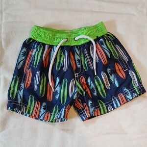 Carter's 12M Navy Swim Trunks with Green, Orange, Light Blue Surfboard Print